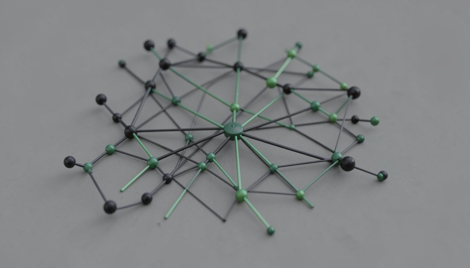 Small thumbnail of a network of connected dots representing vendor network in dark charcoal and green